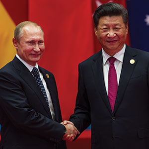 Axis of Authoritarians: Implications of China-Russia Cooperation